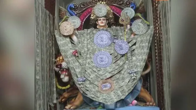 ரூ.9.9 லட்சம் நோட்டுகளால் துர்கை அம்மனுக்கு அலங்காரம் ரூ.9.9 லட்சம் நோட்டுகளால் துர்கை அம்மனுக்கு அலங்காரம்
