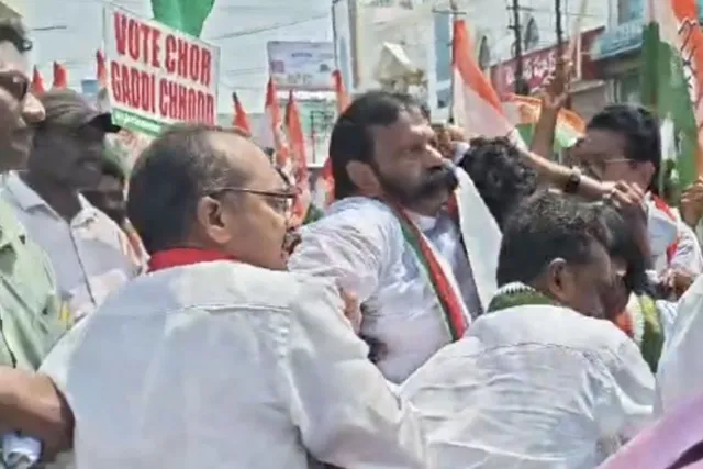 ఎండ వేడికి సొమ్మసిల్లిన మాజీ మంత్రి బాపిరాజు