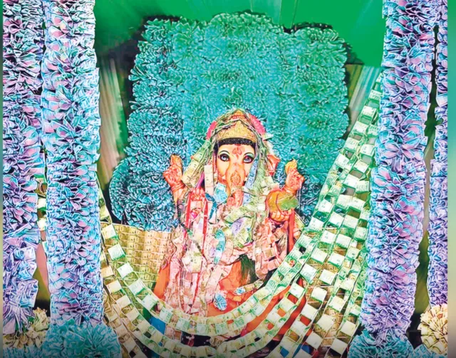 Ganesha statue made with currency notes worth Rs. 9,99,999